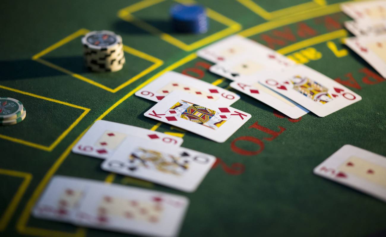 Close-up of playing cards on a roulette table