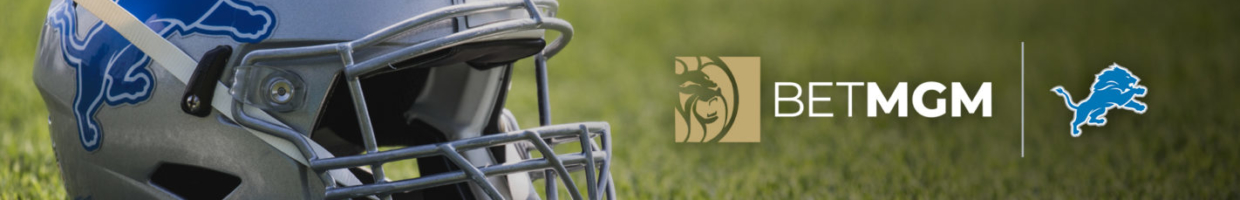 Detroit Lions and BetMGM logos next to a Detroit Lions helmet placed on a field