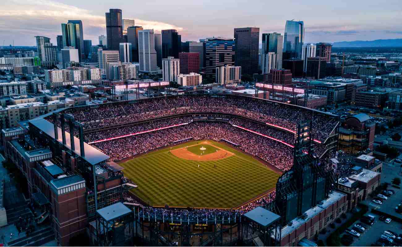 Aerial drone photo of Denver Colorado skyline at sunset