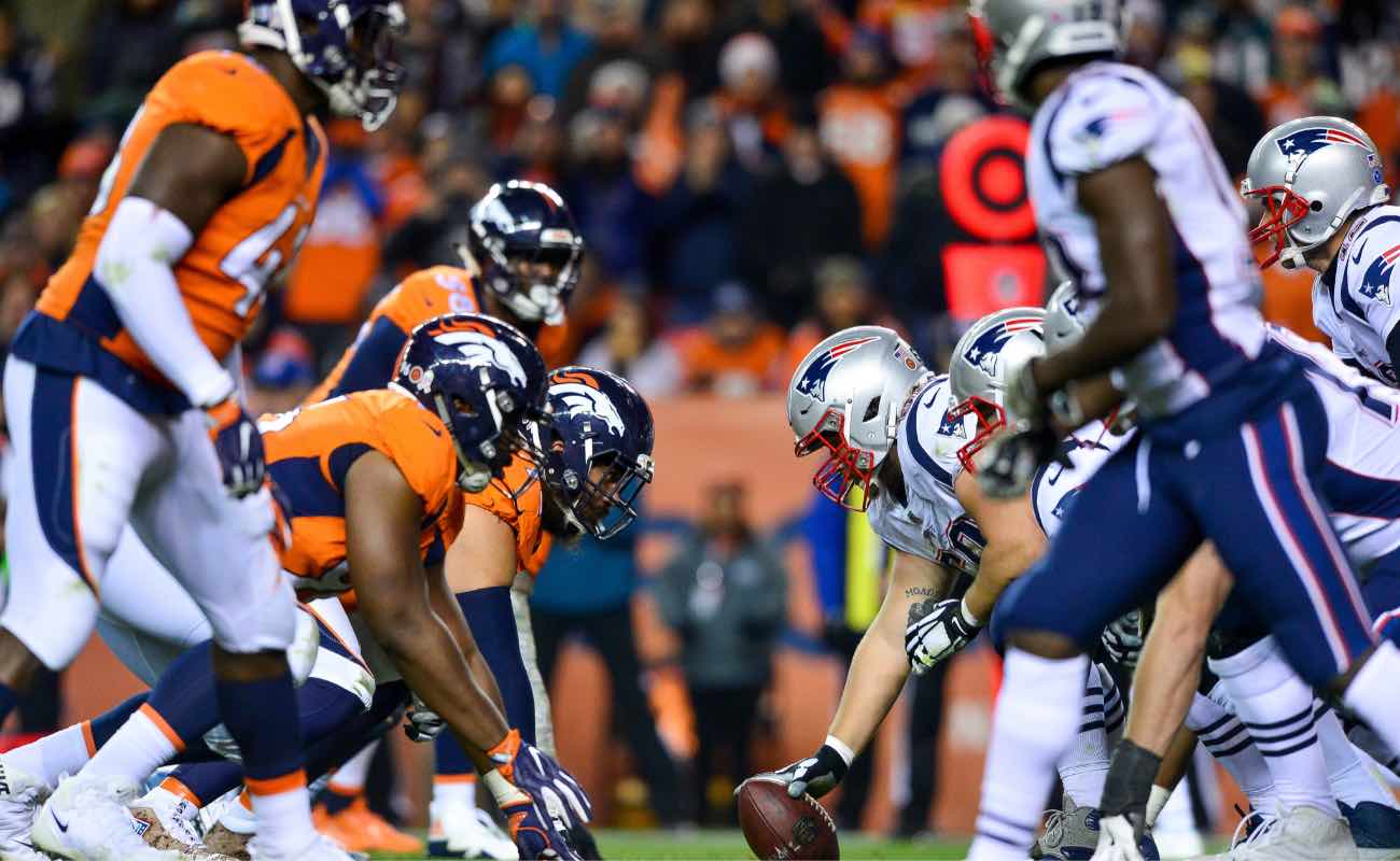New England Patriots offense lines up against the Denver Broncos at Sports Authority Field in November 2017