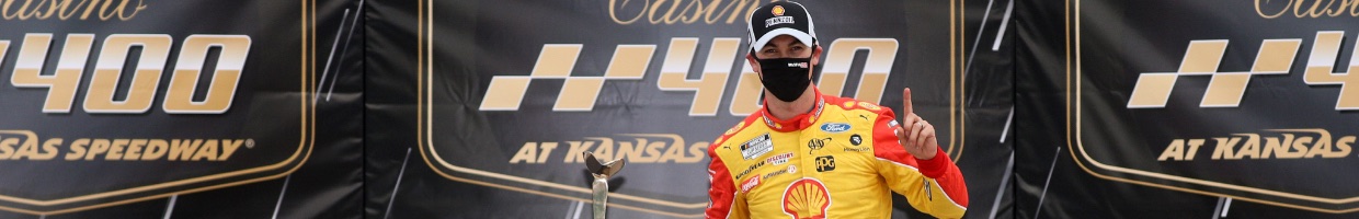 Joey Logano, driver of Shell Pennzoil Ford, celebrates after winning the NASCAR Cup Series Hollywood Casino 400 October 2020