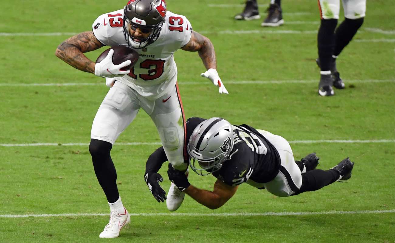 Mike Evans #of Tampa Bay Buccaneers against Erik Harris of Las Vegas Raiders at Allegiant Stadium October 2020. Photo by Ethan Miller/Getty Images