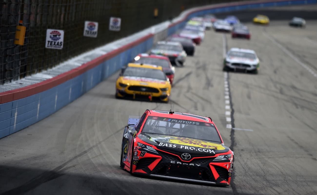 Martin Truex Jr., driver of the #19 Bass Pro Shops Toyota, leads the field at Texas Motor Speedway October 2020.