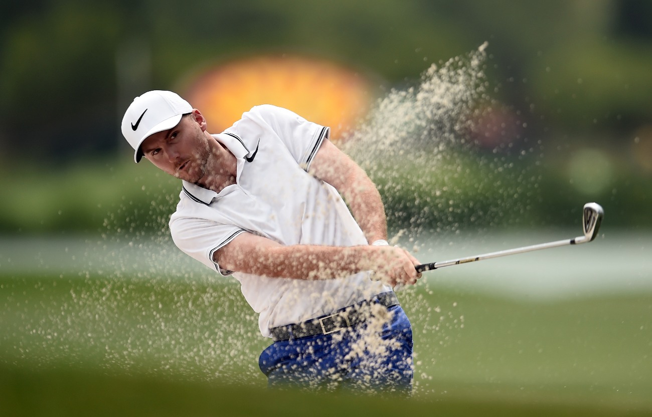 Russell Henley plays his second shot on the 18th hole during the final round of the Shell Houston Open at the Golf Club of Houston on April 2, 2017 in Humble, Texas