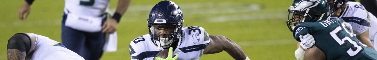 Carlos Hyde of the Seattle Seahawks runs with the ball. Photo by Mitchell Leff/Getty Images