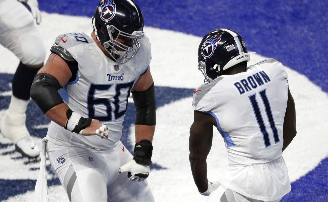 A.J. Brown and Ben Jones of the Tennessee Titans celebrate. Photo by Michael Hickey/Getty Images