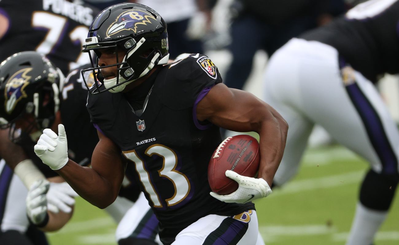 Devin Duvernay, wide receiver for the Baltimore Ravens, rushes with the ball. Photo by Patrick Smith/Getty Images