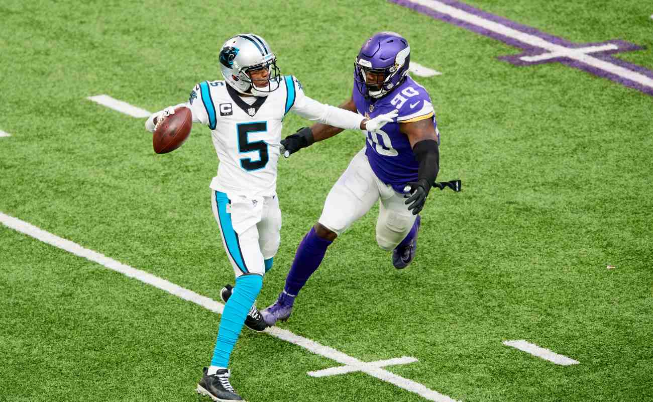 arolina Panthers quarterback Teddy Bridgewater attempts a pass before he is tackled. Photo by Hannah Foslien/Getty Images