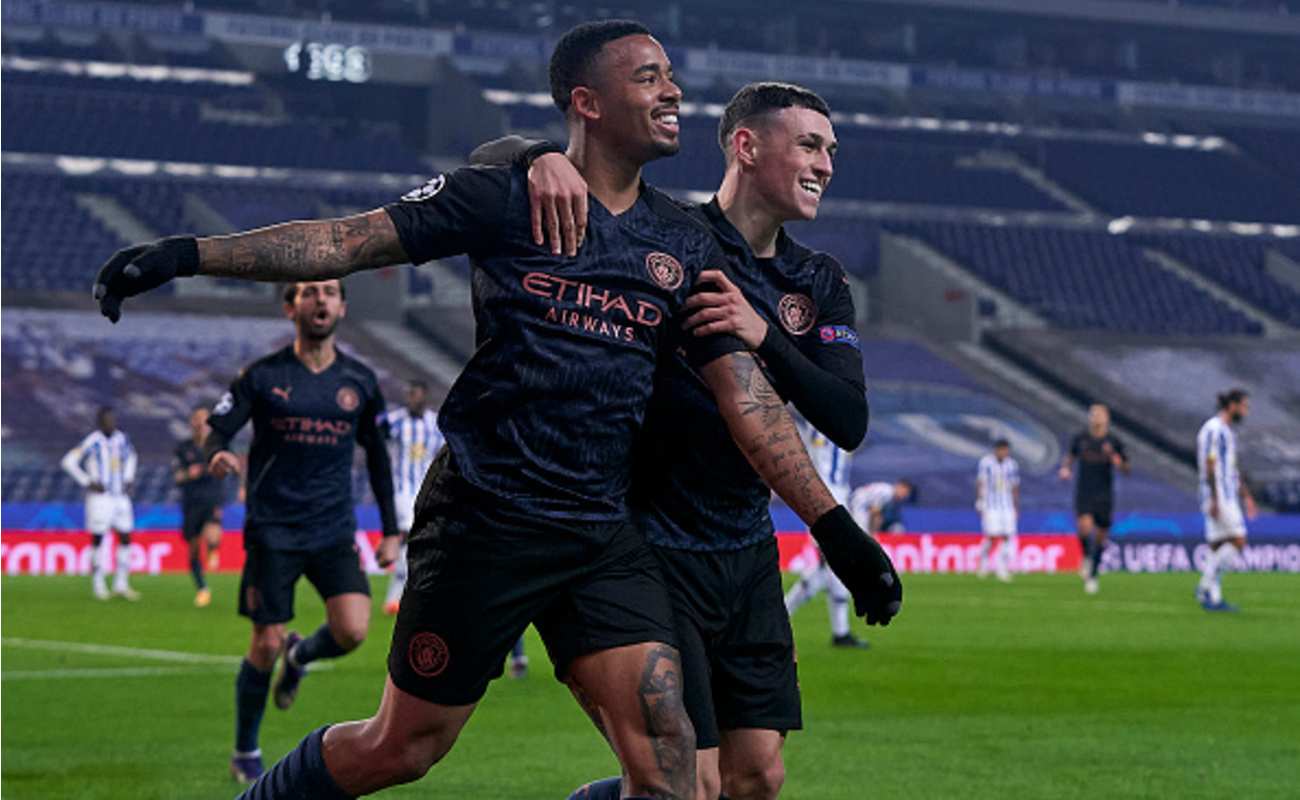 Gabriel Jesus and Phil Foden Celebrate After the Opening Goal Against Porto - Photo by JOSE MANUEL ALVAREZ