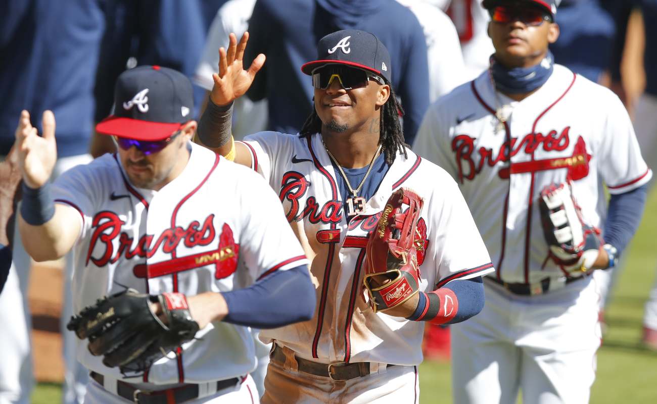 Atlanta Braves’ Ronald Acuna Jr. with his team after a game. Photo by Todd Kirkland/Getty Images