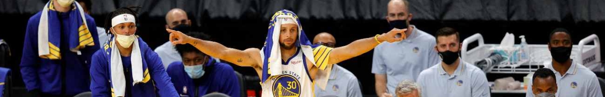 SAN FRANCISCO, CALIFORNIA - DECEMBER 12: Stephen Curry #30 of the Golden State Warriors reacts on the bench during their NBA preseason game against the Denver Nuggets at Chase Center on December 12, 2020 in San Francisco, California. NOTE TO USER: User expressly acknowledges and agrees that, by downloading and or using this photograph, User is consenting to the terms and conditions of the Getty Images License Agreement. (Photo by Ezra Shaw/Getty Images)