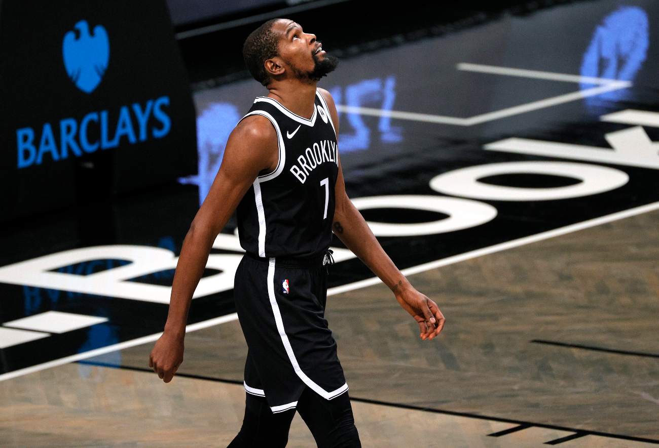 NEW YORK, NEW YORK - DECEMBER 13: Kevin Durant #7 of the Brooklyn Nets looks on during the first half against the Washington Wizards at Barclays Center on December 13, 2020 in the Brooklyn borough of New York City. NOTE TO USER: User expressly acknowledges and agrees that, by downloading and or using this photograph, User is consenting to the terms and conditions of the Getty Images License Agreement. (Photo by Sarah Stier/Getty Images)
