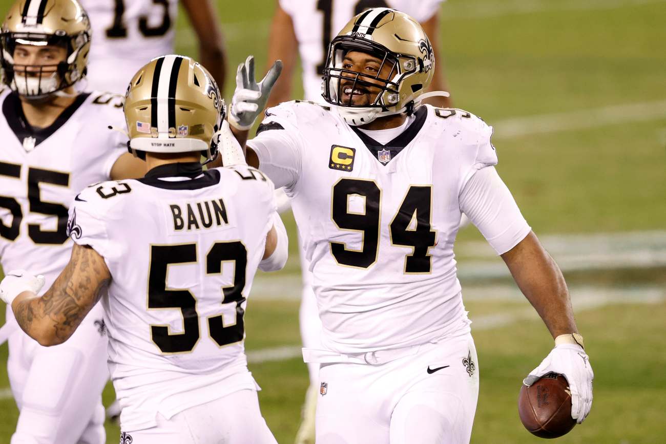 PHILADELPHIA, PENNSYLVANIA - DECEMBER 13: Cameron Jordan #94 of the New Orleans Saints celebrates a fumble recovery against the Philadelphia Eagles at Lincoln Financial Field on December 13, 2020 in Philadelphia, Pennsylvania. (Photo by Tim Nwachukwu/Getty Images)