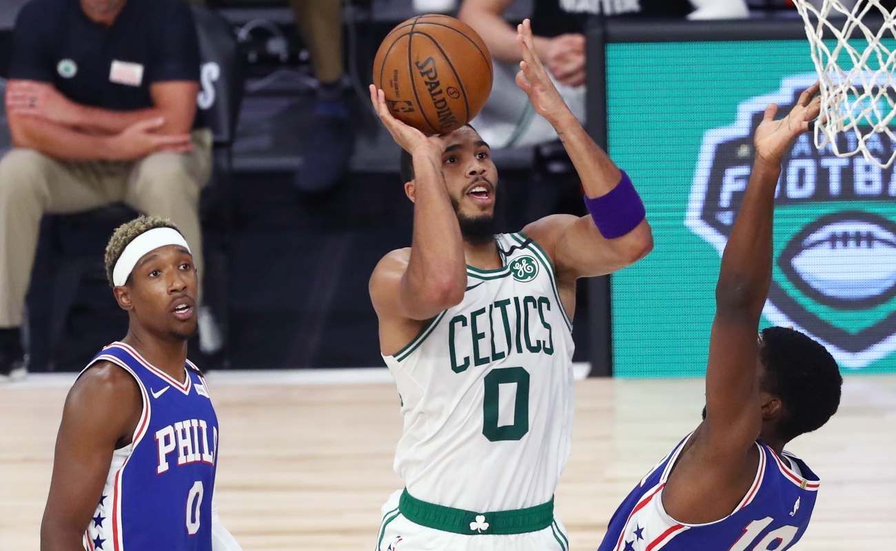 Jayson Tatum #0 of the Boston Celtics shoots over Shake Milton #18 of the Philadelphia 76ers during the second half in Game Four of the first round of the playoffs at The Field House at ESPN Wide World Of Sports Complex on August 23, 2020 in Lake Buena Vista, Florida. (Photo by Kim Klement-Pool/Getty Images)