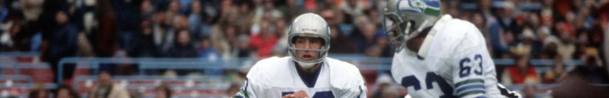 Quarterback Jim Zorn #10 of the Seattle Seahawks scrambles behind the blocking of offensive lineman Nick Bebout #63 during a National Football League game against the Cleveland Browns at Municipal Stadium on November 11, 1979 in Cleveland, Ohio. (Photo by George Gojkovich/Getty Images)