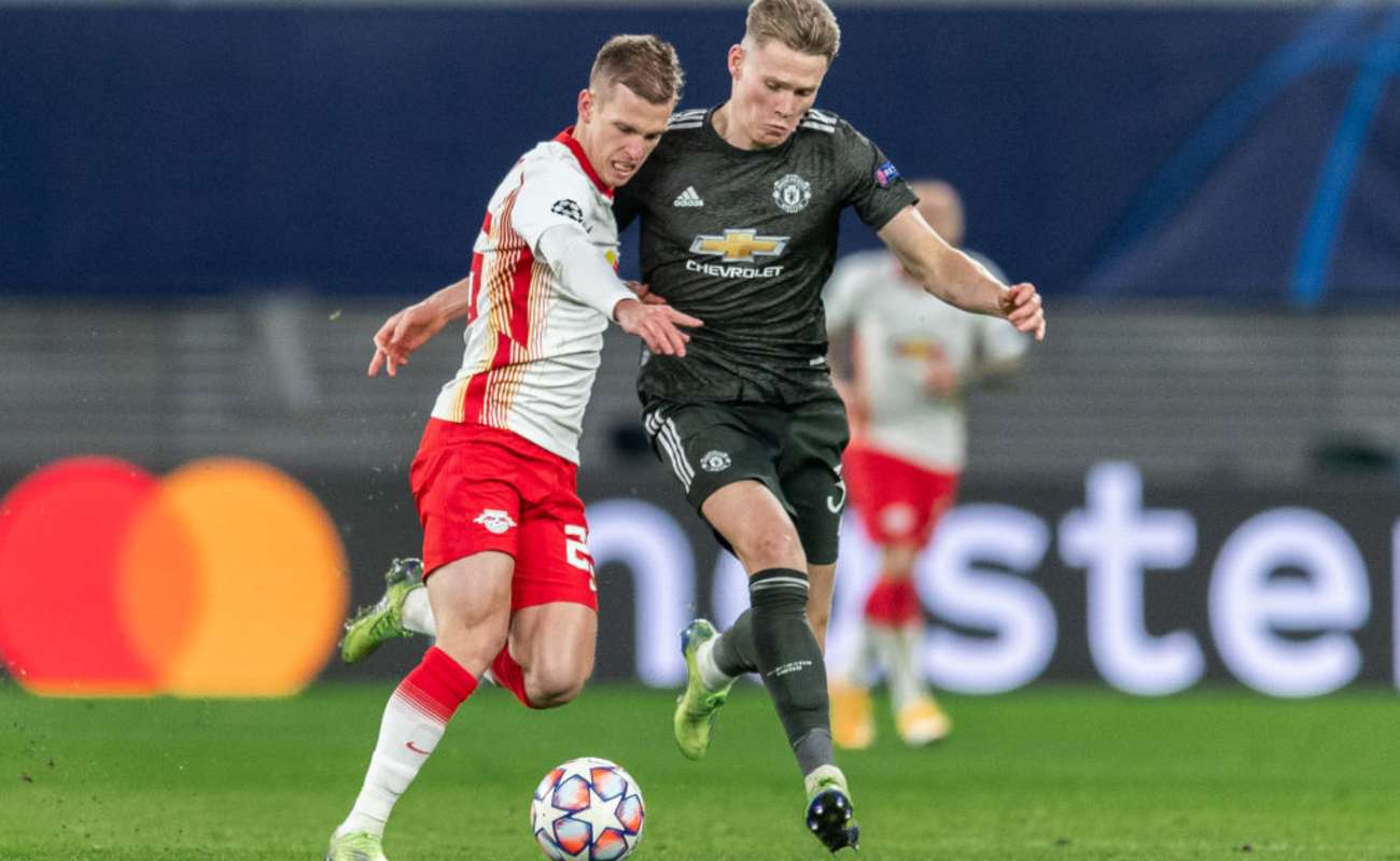 Scott McTominay of Manchester United Tackles Dani Olmo of RB Leipzig - Photo By Boris Streubel