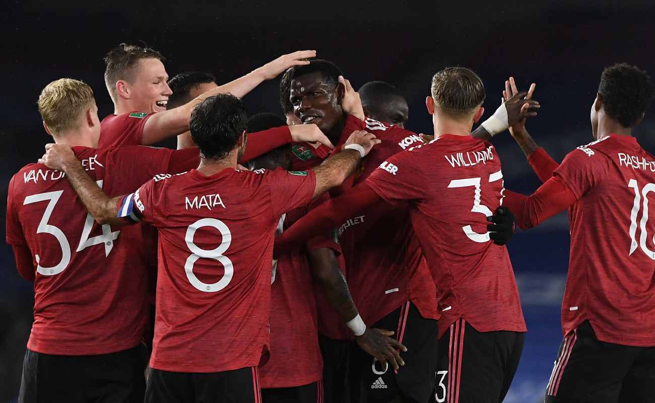 Paul Pogba is Congratulated by His Teammates After Scoring a Goal - Photo Credit: ANDY RAIN/POOL/AFP via Getty Images