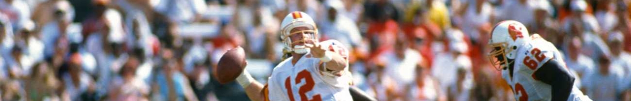 TAMPA BAY, FL - SEPTEMBER 24: Trent Dilfer #12 of the Tampa Bay Buccaneers drops back to pass against the Washington Redskins during an NFL football game September 24, 1995 at Tampa Stadium in Tampa Bay, Florida. Dilfer played for the Buccaneers from 1994-99. (Photo by Focus on Sport/Getty Images)