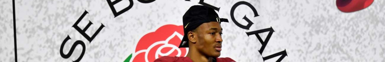 DeVonta Smith, #6 of the Alabama Crimson Tide, stands on the trophy presentation stage after the College Football Playoff Semifinal at the Rose Bowl football game against the Notre Dame Fighting Irish at AT&T Stadium on January 01, 2021, in Arlington, Texas. The Alabama Crimson Tide defeated the Notre Dame Fighting Irish 31-14. (Photo by Alika Jenner/Getty Images)