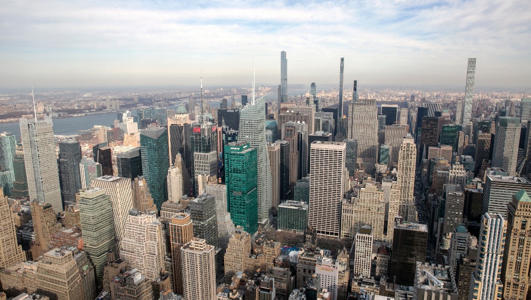The Manhattan skyline is seen from the observatory of the Empire State Building in New York City on Wednesday, January 12, 2022. (AP Photo/Ted Shaffrey)