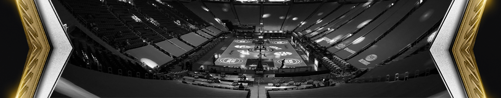 Black and white picture of an empty basketball court