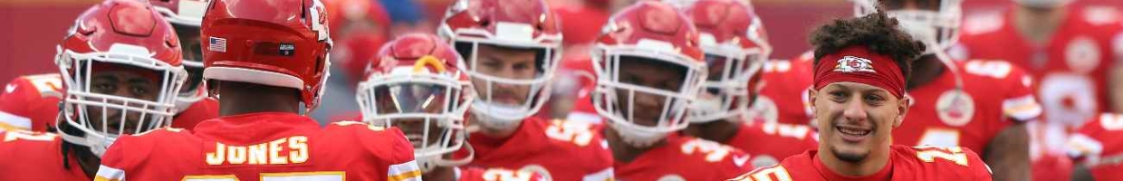 KANSAS CITY, MISSOURI - JANUARY 17: Quarterback Patrick Mahomes #15 of the Kansas City Chiefs welcomes defensive tackle Chris Jones #95 onto the field to start the AFC Divisional Playoff game against the Cleveland Browns at Arrowhead Stadium on January 17, 2021 in Kansas City, Missouri. (Photo by Jamie Squire/Getty Images)