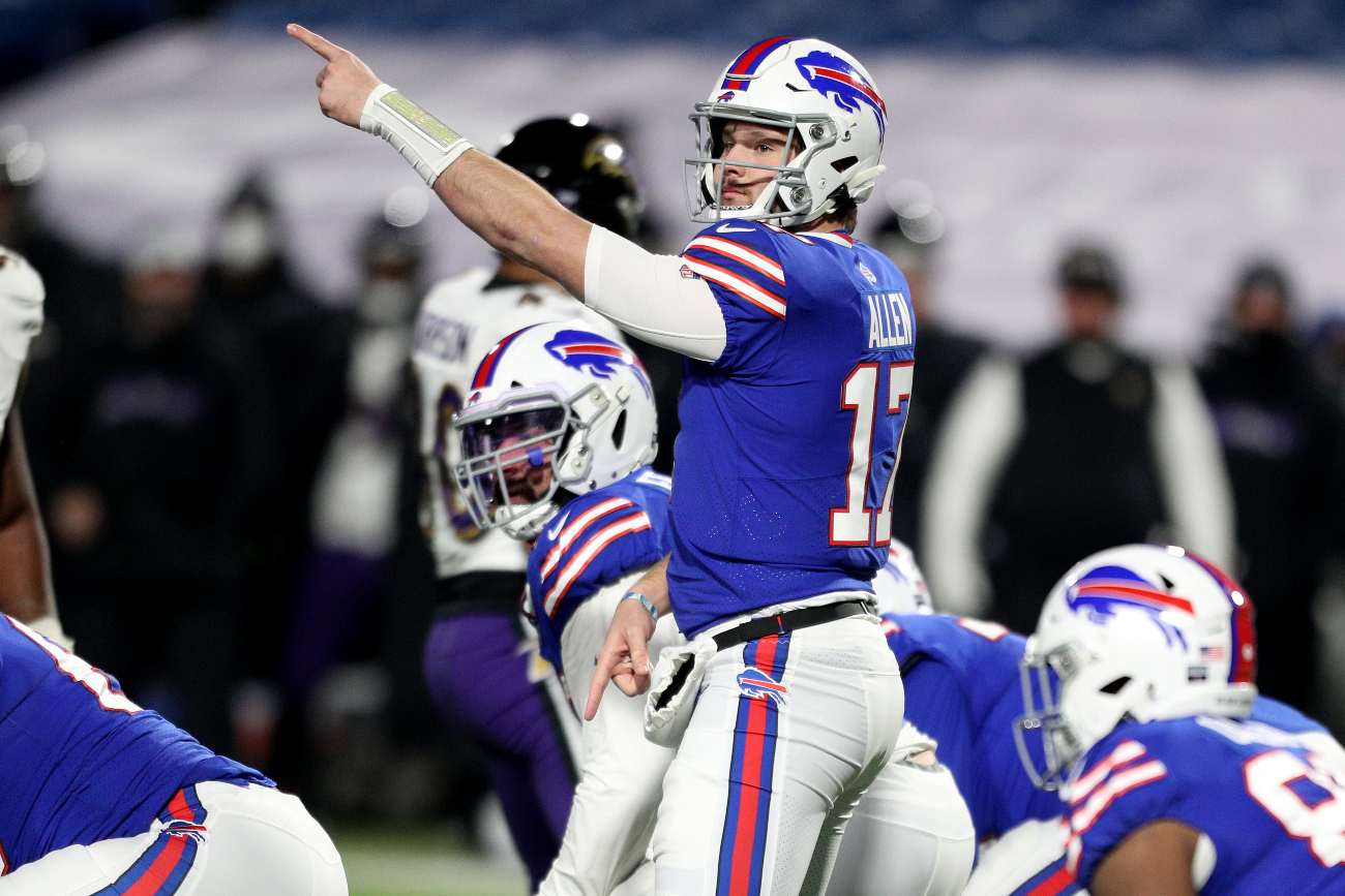 ORCHARD PARK, NEW YORK - JANUARY 16: Josh Allen #17 of the Buffalo Bills signals during the fourth quarter of an AFC Divisional Playoff game against the Baltimore Ravens at Bills Stadium on January 16, 2021 in Orchard Park, New York. (Photo by Bryan Bennett/Getty Images)
