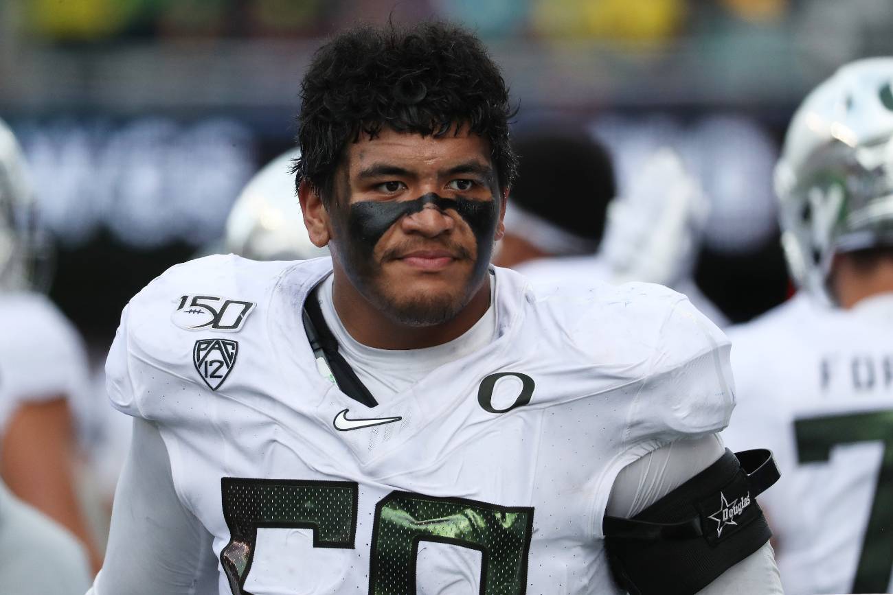 Penei Sewell #58 of the Oregon Ducks looks on in the fourth quarter against the Washington Huskies during their game at Husky Stadium on October 19, 2019, in Seattle, Washington. (Photo by Abbie Parr/Getty Images)