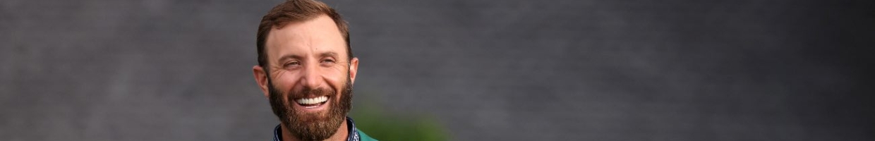 AUGUSTA, GEORGIA - NOVEMBER 15: Dustin Johnson of the United States reacts during the Green Jacket Ceremony after winning the Masters during the final round of the Masters at Augusta National Golf Club on November 15, 2020 in Augusta, Georgia. (Photo by Rob Carr/Getty Images)