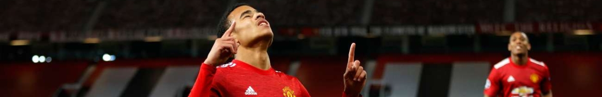 MANCHESTER, ENGLAND - OCTOBER 28: Mason Greenwood of Manchester United celebrates after scoring his sides first goal during the UEFA Champions League Group H stage match between Manchester United and RB Leipzig at Old Trafford on October 28, 2020 in Manchester, England. Sporting stadiums around the UK remain under strict restrictions due to the Coronavirus Pandemic as Government social distancing laws prohibit fans inside venues resulting in games being played behind closed doors. (Photo by Clive Brunskill/Getty Images)