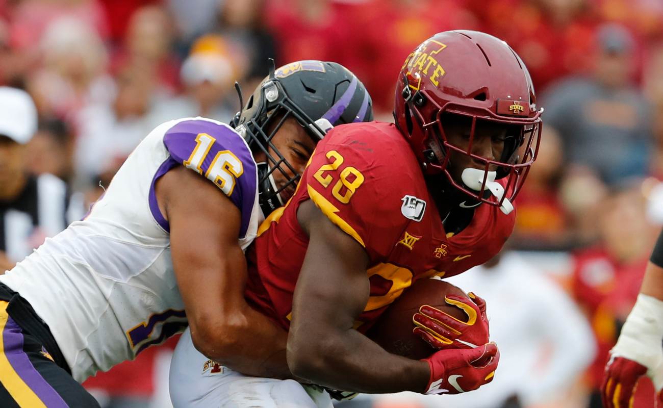 AMES, IA - AUGUST 31: Defensive lineman Elerson Smith #16 of the Northern Iowa Panthers tackles running back Breece Hall #28 of the Iowa State Cyclones as he rushed for yards in the second half of play at Jack Trice Stadium on August 31, 2019 in Ames, Iowa. The Iowa State Cyclones won 29-26 over the Northern Iowa Panthers in triple overtime. (Photo by David Purdy/Getty Images)