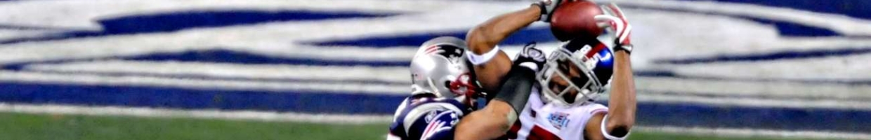 UNITED STATES - FEBRUARY 03: David Tyree of the New York Giants catches a pass for a first down against the New England Patriots in the fourth quarter of Super Bowl 42 at the University of Phoenix Stadium in Glendale, Arizona, U.S., on Sunday, Feb. 3, 2008. The Giants beat New England 17-14 to win the National Football League's Super Bowl and end the Patriots' run at an undefeated season. (Photo by Rhona Wise/Bloomberg via Getty Images)