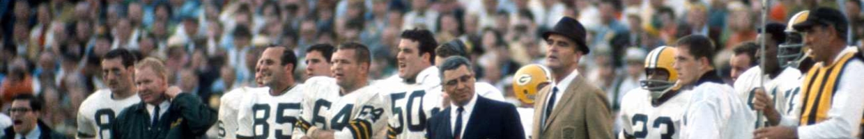 MIAMI, FL - January 14: Head Coach Vince Lombardi (dark Jacket) of the Green Bay Packers looks on from the sidelines against the Oakland Raiders during Super Bowl II January 14, 1968 at the Orange Bowl in Miami, Florida. The Packers won the game 33-14. (Photo by Focus on Sport/Getty Images)