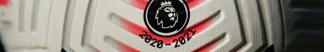 Premier League logo and season dates on a matchday ball - Photo by Visionhaus/Getty Images