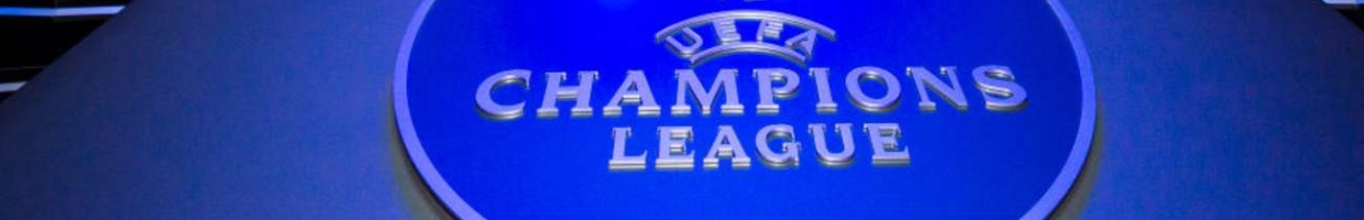 The Champions League Logo on a blue background - Photo by Visionhaus/Getty Images