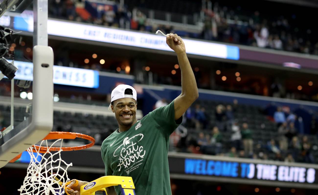 WASHINGTON, DC - MARCH 31: Xavier Tillman #23 of the Michigan State Spartans celebrate by cutting down the net after defeating the Duke Blue Devils in the East Regional game of the 2019 NCAA Men's Basketball Tournament at Capital One Arena on March 31, 2019 in Washington, DC. The Michigan State Spartans defeated the Duke Blue Devils with a score of 68 to 67. (Photo by Rob Carr/Getty Images)