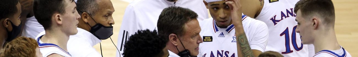 Head coach Bill Self of the Kansas Jayhawks talks with players during a timeout in the quarterfinal game of the Big 12 basketball tournament against the Oklahoma Sooners at the T-Mobile Center on March 11, 2021, in Kansas City, Missouri. (Photo by Jamie Squire/Getty Images)