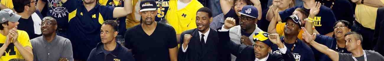 ATLANTA, GA - APRIL 08: Former Michigan Wolverines players Juwan Howard, Jimmy King, Ray Jackson and Jalen Rose cheer on the Wolverines as they take on the Louisville Cardinals during the 2013 NCAA Men's Final Four Championship at the Georgia Dome on April 8, 2013 in Atlanta, Georgia. (Photo by Kevin C. Cox/Getty Images)