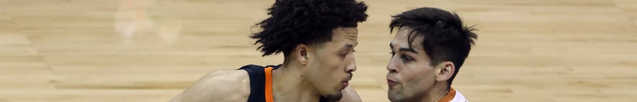 Cade Cunningham #2 of the Oklahoma State Cowboys drives as Brock Cunningham #30 of the Texas Longhorns defends during the Big 12 Basketball Tournament championship game at the T-Mobile Center on March 13, 2021, in Kansas City, Missouri. (Photo by Jamie Squire/Getty Images)