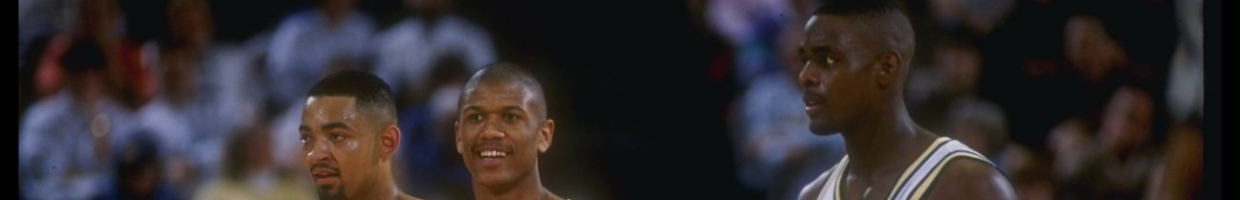 8 Mar 1992: Michigan Wolverines forward Juwan Howard, guard Jalen Rose, and forward Chris Webber (l to r) look on during a game against the Indiana Pacers (Getty Images).
