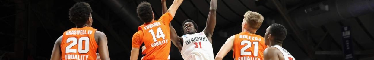 Nathan Mensah #31 of the San Diego State Aztecs shoots over Jesse Edwards #14 of the Syracuse Orange during the second half in the first round game of the 2021 NCAA Men's Basketball Tournament at Hinkle Fieldhouse on March 19, 2021 in Indianapolis, Indiana. (Photo by Andy Lyons/Getty Images)