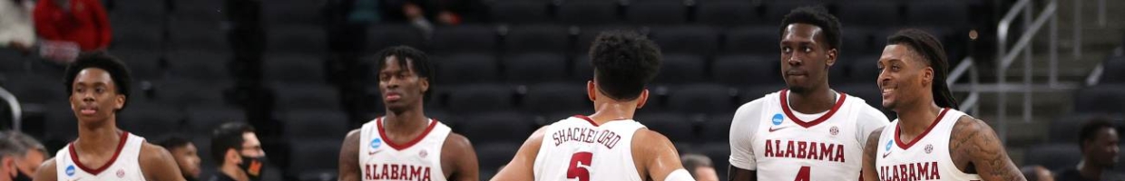 Jaden Shackelford #5 of the Alabama Crimson Tide reacts with teammates late in the first half against the Maryland Terrapins in the second round game of the 2021 NCAA Men's Basketball Tournament at Bankers Life Fieldhouse on March 22, 2021 in Indianapolis, Indiana. (Photo by Stacy Revere/Getty Images)