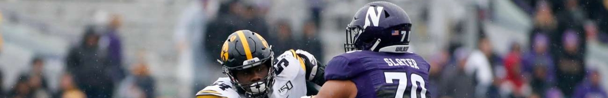 EVANSTON, ILLINOIS - OCTOBER 26: Daviyon Nixon #54 of the Iowa Hawkeyes is blocked by Rashawn Slater #70 of the Northwestern Wildcats at Ryan Field on October 26, 2019 in Evanston, Illinois. (Photo by Justin Casterline/Getty Images)