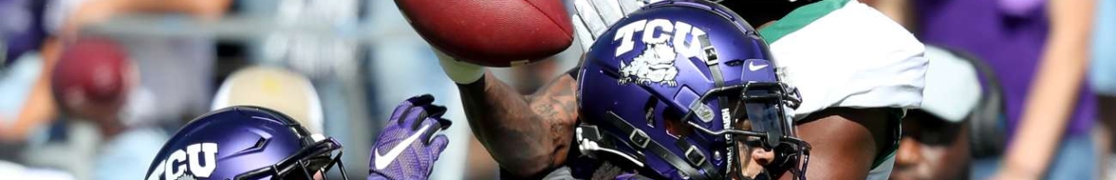 FORT WORTH, TEXAS - NOVEMBER 09: Denzel Mims #5 of the Baylor Bears bobbles a pass against Tre'Vius Hodges-Tomlinson #1 of the TCU Horned Frogs and Trevon Moehrig #7 of the TCU Horned Frogs in the second half at Amon G. Carter Stadium on November 09, 2019 in Fort Worth, Texas. (Photo by Tom Pennington/Getty Images)