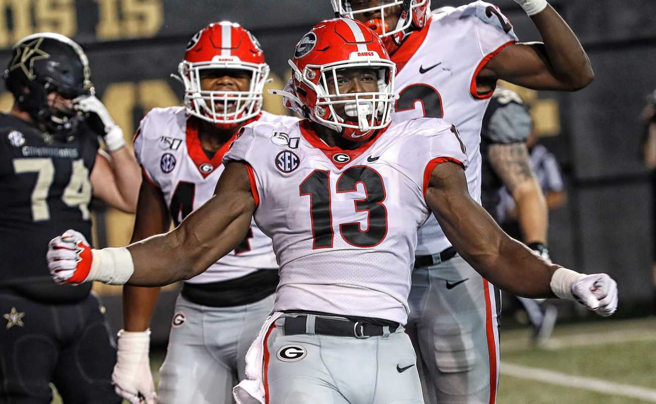 NASHVILLE, TENNESSEE - AUGUST 31: Azeez Ojulari #13 of the Georgia Bulldogs celebrates after a sack against the Vanderbilt Commodores at Vanderbilt Stadium on August 31, 2019 in Nashville, Tennessee. (Photo by Frederick Breedon/Getty Images)