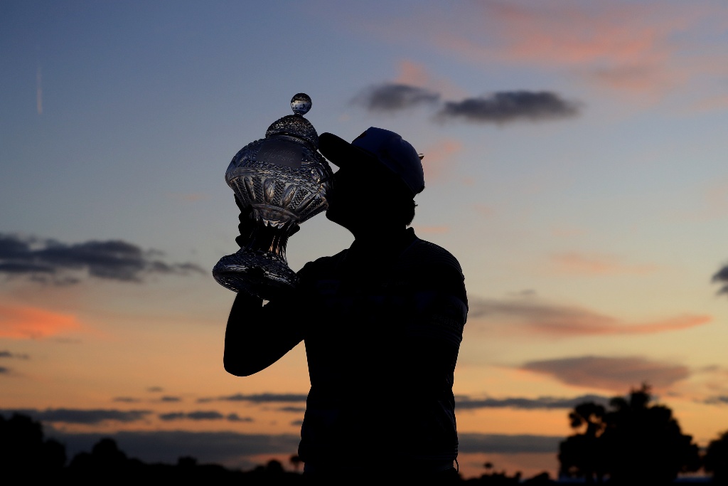 Alt: Sungjae Im of South Korea poses with the trophy after winning the Honda Classic at PGA National Resort and Spa Champion Course on March 01, 2020, in Palm Beach Gardens, Florida. (Photo by Sam Greenwood/Getty Images)