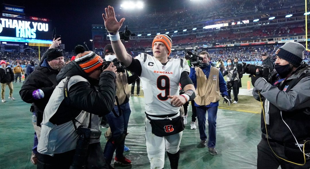 Cincinnati Bengals quarterback Joe Burrow waves to fans as he leaves the field after the Bengals beat the Tennessee Titans in an NFL divisional round playoff football game Monday, Jan. 24, 2022, in Nashville, Tenn. (AP Photo/Mark Humphrey)