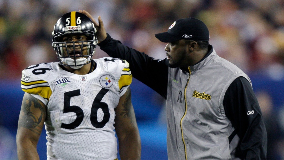Pittsburgh Steelers head coach Mike Tomlin, right, talks to his player LaMarr Woodley during the third quarter of the NFL Super Bowl XLIII football game against the Arizona Cardinals, Sunday, Feb. 1, 2009, in Tampa, Fla. (AP Photo/David J. Phillip)