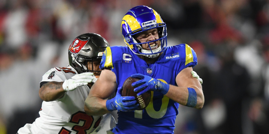 Los Angeles Rams wide receiver Cooper Kupp (10) beats Tampa Bay Buccaneers safety Antoine Winfield Jr. (31) during the second half of an NFL divisional round playoff football game Sunday, Jan. 23, 2022, in Tampa, Fla. (AP Photo/Jason Behnken)